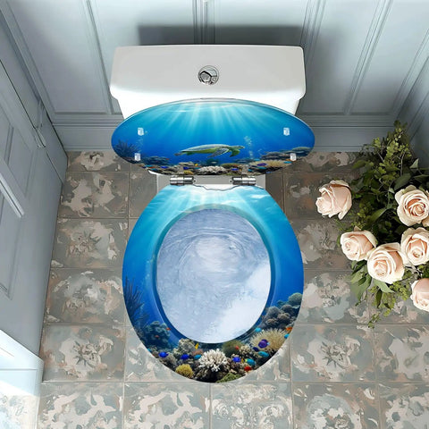 Round Resin Quiet Close Toilet Seat Cover for Bathroom with ocean scene design, adjustable fit, and decorative blue hues.