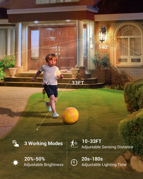 Lit Outdoor Motion Sensor Wall Light With Dusk To Dawn Feature Water Ripple Glass Porch Lantern shown illuminating a boy playing outside at night.
