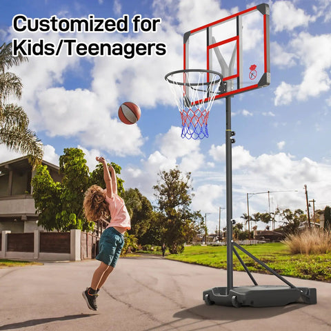 Kid playing basketball with Kids Adjustable Outdoor Basketball Hoop 4.82 To 8.53 Feet Portable Backyard Driveway Hoop With Enlarged Base And PC Backboard For Kids Teens And Youth Today