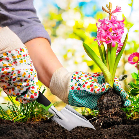 Person using Two Pack Garden Trowel Hand Shovel Set With Soft Rubberized Non Slip Handle Aluminum Alloy Potting Shovel for planting