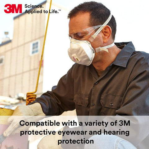 Man wearing Disposable Particulate Cup Respirator 8293 P100 With Cool Flow Exhalation Valve adjusting machinery