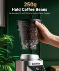 Ditch The Clutter And Ditch The Static With This Sharp Conical Burr Coffee Grinder Rocking A Bold 40Mm Stainless Steel Core And Thirty Four Dial Tweaks To Keep Grinds Light And Flavor Rich For Any Home Barista Wanting That Daily Smooth Sip, showcasing a hand holding a 250g coffee bean hopper.