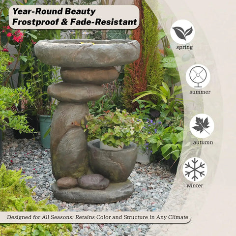Freestanding solar rock waterfall with LED lights for garden, used as bird bath and planter. Durable design, visible in lush yard.