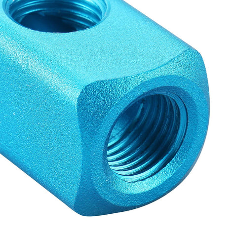 Close-up of blue Aluminum Air Manifold Block 4 Way 7 Port 1/4 Inch PT Threaded For Pneumatic Systems showing port detail