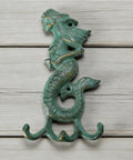 Premium Cast Iron Mermaid Wall Hook With Solid Metal Finish Totally Awesome Vintage Nautical Coat And Towel Hanger on wood background
