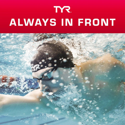 Swimmer wearing TYR swim cap and goggles, underwater action, promoting TYR's 'Always in Front' campaign.