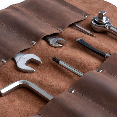 Leather Tool Roll Up 12 Slot Heavy Duty Tool Organizer Bag with tools in pockets, brown leather, compact and durable for professionals.