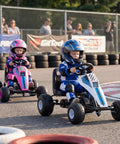 Children racing in Kids Pedal Go Kart With Adjustable Seat Handbrake Free Wheel And Pedal Modes Four Wheel Ride On Toy Car