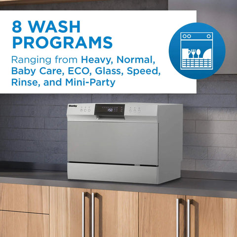 Total Game Changer Compact Countertop Dishwasher In Brushed Stainless Steel with 8 wash programs displayed on the control panel.