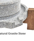 Close-up of Manual Stone Grain Mill For Dry And Wet Grinding showing natural granite stone and wood base detail.