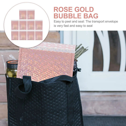 Rose gold bubble mailer partially inside black bag, labeled 'Rose Gold Bubble Bag', showcasing easy peel and seal feature