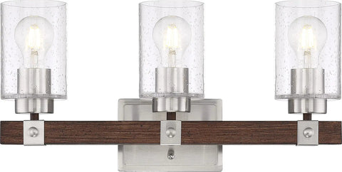 Front view of Arabel Three Light Vanity Fixture in brushed nickel and nutmeg wood finish with clear seeded glass shades.