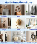 Multi-functional display of Super Strong Adhesive Hooks With Extended Stainless Steel Bar For Heavy Duty Wall Mount holding clothes, bags, towels, and more.