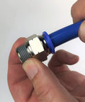Five Piece Push To Connect Outlet Block Fittings Kit showing hand connecting blue tubing to a silver fitting with threads.
