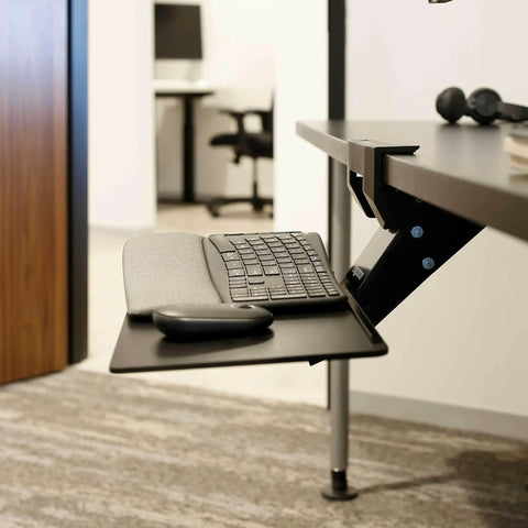 Razor Smooth Glide Under Desk Keyboard Tray With Adjustable Height Slide Out Arm and Easy Tilt Lift, 27x9 inch setup in modern office.