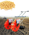 Double Row Manual Seed Seeder Hand Push Garden Seeder Walk Behind Planter Roller Seeding And Fertilizer Applicator Portable Seed Planter With 12 Mouths No Bending Needed in a field next to seeds