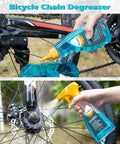 Applying Bike Chain Cleaner Kit With Bicycle Cleaner Degreaser Lubricant And 12 Piece Cleaning Set on bike chain and wheel.