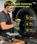 Person using Cordless One Half Inch Impact Wrench With 800 N m Max Torque Brushless Motor on car tire