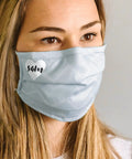 Woman wearing custom mask with heart design using Stretchable Heat Transfer Paper For Light Fabrics Inkjet Printer Ready.
