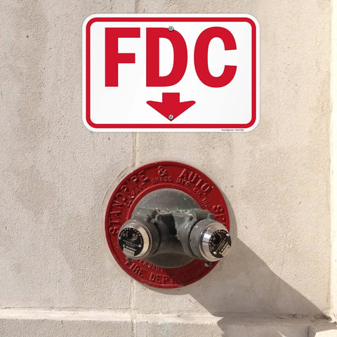 Rugged 12X18 Inch Fdc Fire Department Connection Metal Sign With Down Arrow In Red And White above fire hydrant on wall.