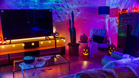Ark Lite LED Aurora Projector with Laser Nebula and Galaxy Lighting in a game room setting with ambient light effects.