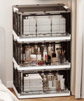 Hella Spacious Clear Stackable Storage Bins Three Pack With Lids And Rolling Wheels Collapsible Containers for toiletries and towels.