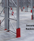 Industrial warehouse floor with metal racking and red protective guards for secure racking installation.