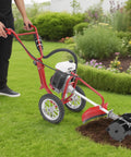 Person using Gas Powered Tiller With Wheels 63cc 4 Stroke Cultivator 4HP Mini Rototiller For Mowing Tilling And Trenching on lawn