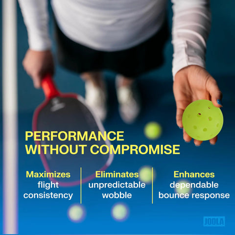 Person holding Hardcourt Pickleball Balls with Storage Tube USAP Approved for Tournament Play Durable Indoor Outdoor Balls