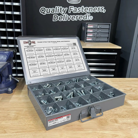 Open kit displaying assorted Grade 5 hex cap screws, nuts, washers, lock washers, 574 piece set in zinc clear finish.