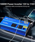 1000 Watt DC To AC Inverter With Dual 110V Outlets Smart Digital Display And Cigarette Lighter Adapter For Cars Trucks Rvs Boats Plug And Play Road Ready Kit on car console with USB connections.