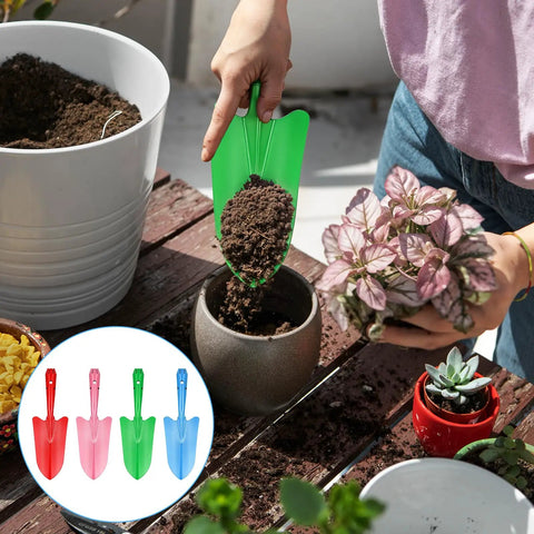 Person using green shovel from 20 Pack Mini Colorful Metal Hand Shovels And Trowels Set For Transplanting And Garden Digging, 11 By 3 Inch Shovels