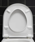 Slick Starck 3 White Toilet Seat With Smooth As Butter Soft Close Hinges top view showing designer contour and hinges.