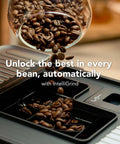 Compact Fully Automatic Espresso And Iced Coffee Maker With One Touch Brewing High Pressure Pump And Rapid Milk Frother For Butter Smooth Lattes That Hit The Spot featuring coffee beans being poured into built-in grinder.