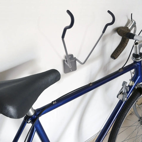 Heavy Duty Bike Wall Mount With EVA Foam Padding And 50lb Capacity, holding a blue road bike on a white wall.