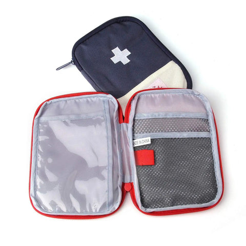 Open view of Two Pack Grab And Go First Aid Bag Portable Medical Kit for outdoor use, 7x5 inch, showing interior compartments
