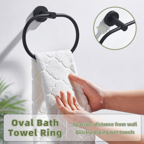 Killer Matte Black Oval Towel Ring Features Smooth Swivel Action Wall Mounted Bathroom Accessory in use with a white towel.