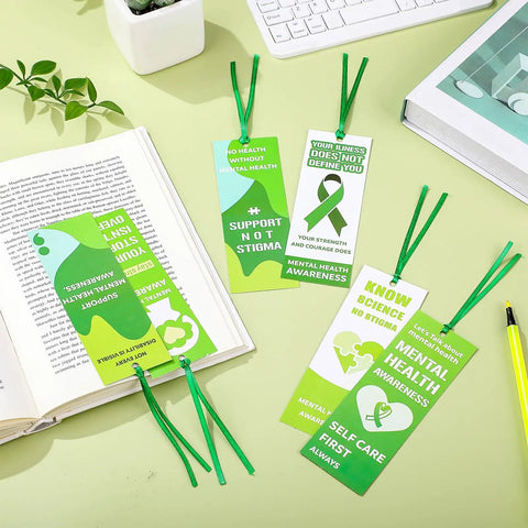 Must Have 120 Pack Mental Health Awareness Bookmarks With 6 Styles, Double Sided Designs Plus 120 Green Ribbons displayed on desk