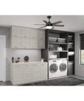 Indoor Ceiling Fan With LED Light In Rustic Bronze Finish, 44 Inch Blade Span, installed in modern laundry room