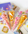 50 Pack Cone Shaped Clear Cellophane Treat Bags With Twist Ties Rainbow Color Party Favor Bags For Treats And Gifts Displayed