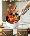Cooking seafood in Electric Hot Pot With Steamer 2L Nonstick Saute Pan 5 In 1 Fast Easy Multifunctional Cooker