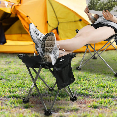 Person relaxing with feet on Lightweight Camping Stool Portable Folding Seat For Camping Hiking Fishing Beach Picnics And Travel With Carry Bag Grey Ultralight Durable Sit Anywhere On The Go Outdoor Gear