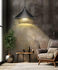 Knockout Black Plug In Pendant Light With Adjustable 13 Ft Copper Cord And UL Certified E26 Socket illuminating a cozy reading nook.