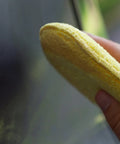 Using Microfiber Polishing Pads Set For Car Detailing 5 Inch Yellow 6 Pack Ultra Soft Cleaning Pads on car surface