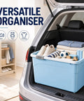 Hassle Free Stackable Storage Bins With Slick Rolling Wheels And Secure Tight Fitting Lids tailored for crunching clutter closets dorm rooms and garage use in a trunk with shoes and clothes.