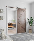 Brushed Nickel Barn Door Hardware Kit For 36 Inch Wide Doors Heavy Duty Sliding Track With Quiet Operation Easy To Install 6 Feet Rail System J Shape Hanger Fits 36 Inch Door Smooth And Durable Frame For Home Interior. Installed in a modern living room.