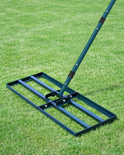 Lawn Leveling Rake With 78 Inch Adjustable Steel Handle in use on grass, showing heavy duty landscape rake for leveling soil, sand, dirt.