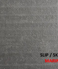 Close-up of slip-resistant marine backing on Beige Indoor 15 Pack Stair Treads Set With Anti Slip Carpet Covers 8x30 Inches Slip Resistant