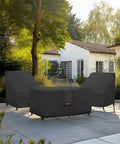 Waterproof 600D Rectangular Fire Pit Cover For 48 By 28 Inch Fire Tables set on patio, protecting outdoor furniture, black.
