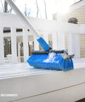 10 Inch Bi Level Soft Wash Brush Drops Onto Water Flow Poles Easily, cleaning a patio with dual tier bristles and soap.